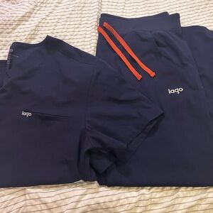 Lago Navy Scrub Set with Orange Accents